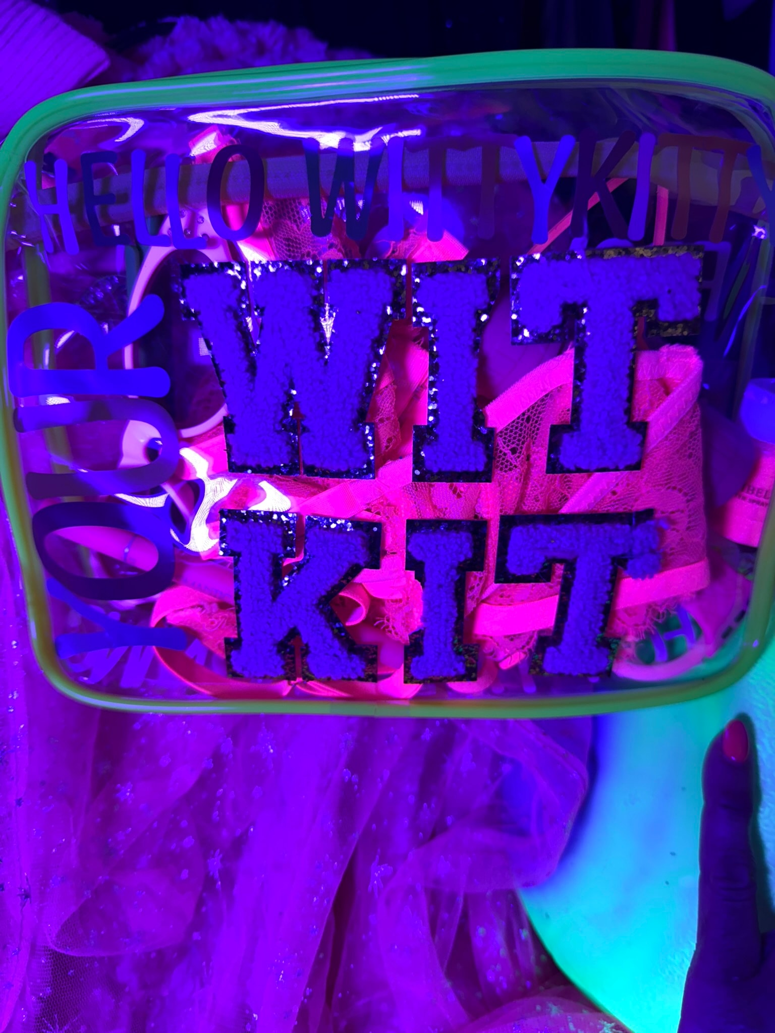 Neon sign glowing purple pink blue