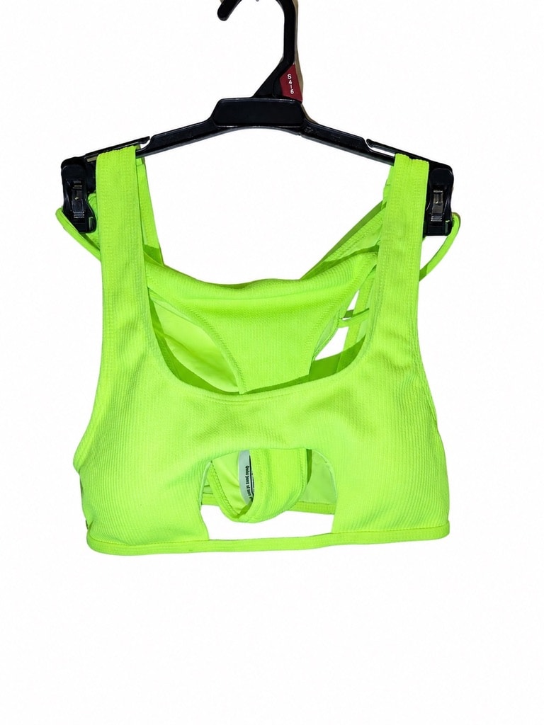 Neon green sports bra on hanger